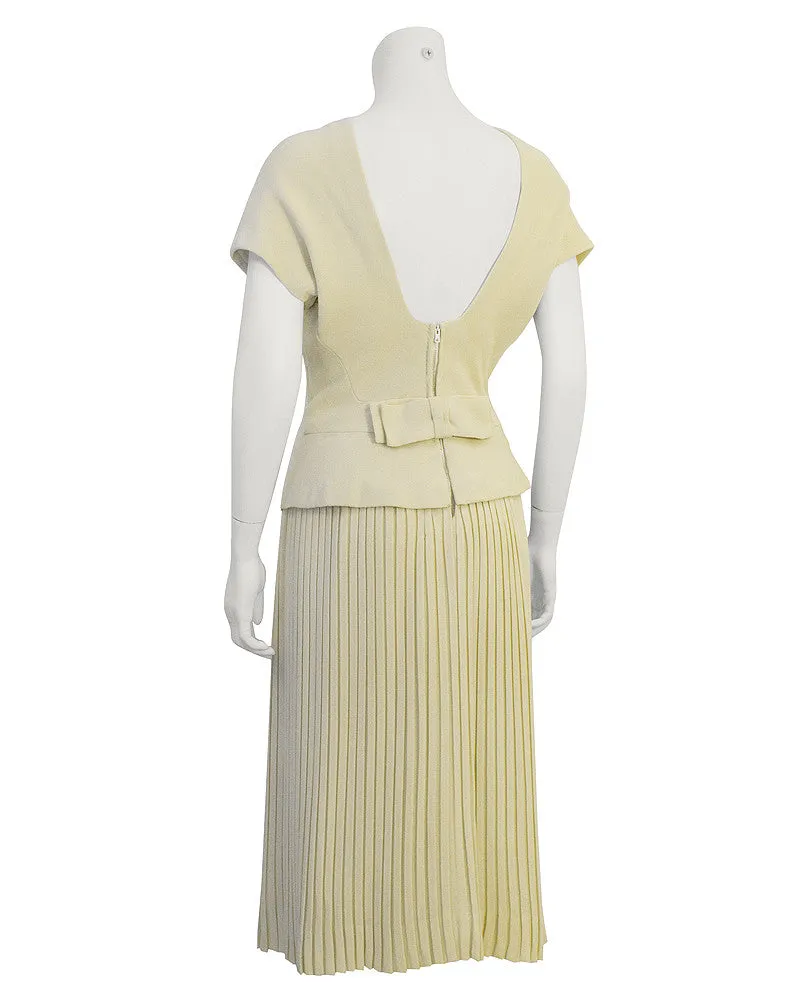 Cream Dress with Pleated Skirt and Bow Detail
