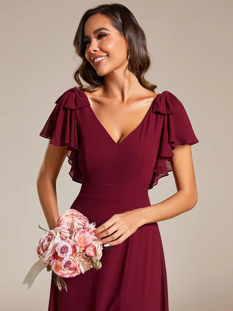 Robe de demoiselle d'honneur trapèze en mousseline à manches courtes avec nœud papillon et fente haute sur le devant