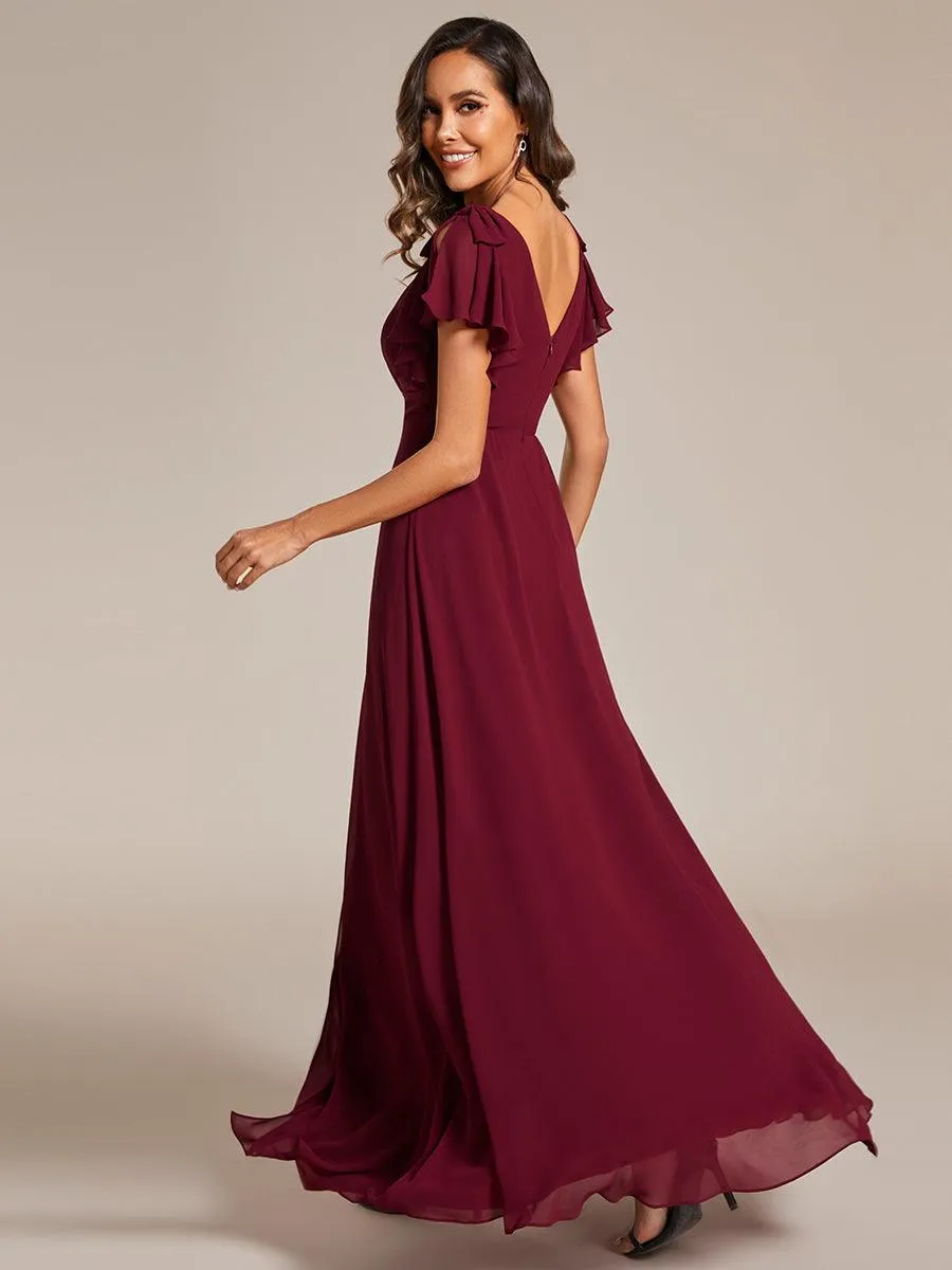 Robe de demoiselle d'honneur trapèze en mousseline à manches courtes avec nœud papillon et fente haute sur le devant