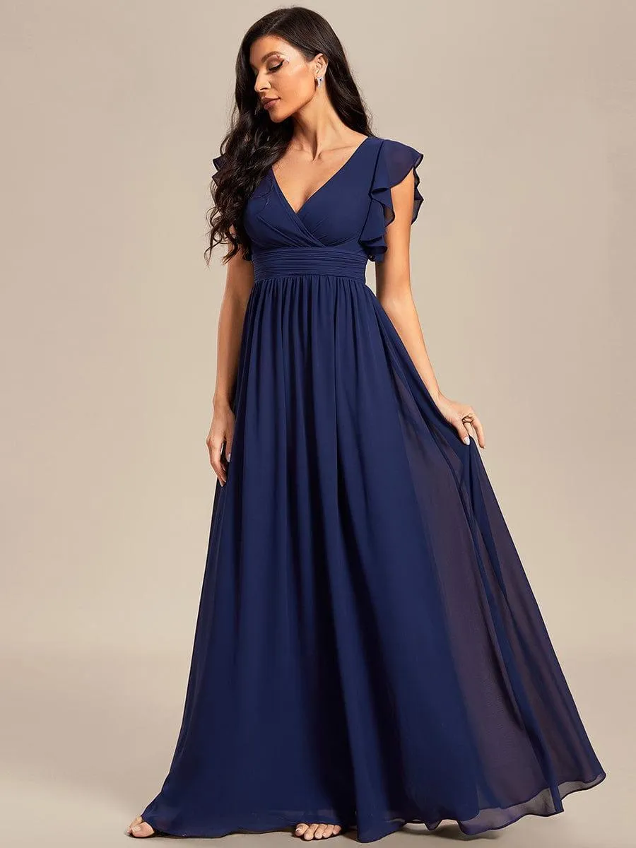 Robe de soirée en mousseline à manches volantées