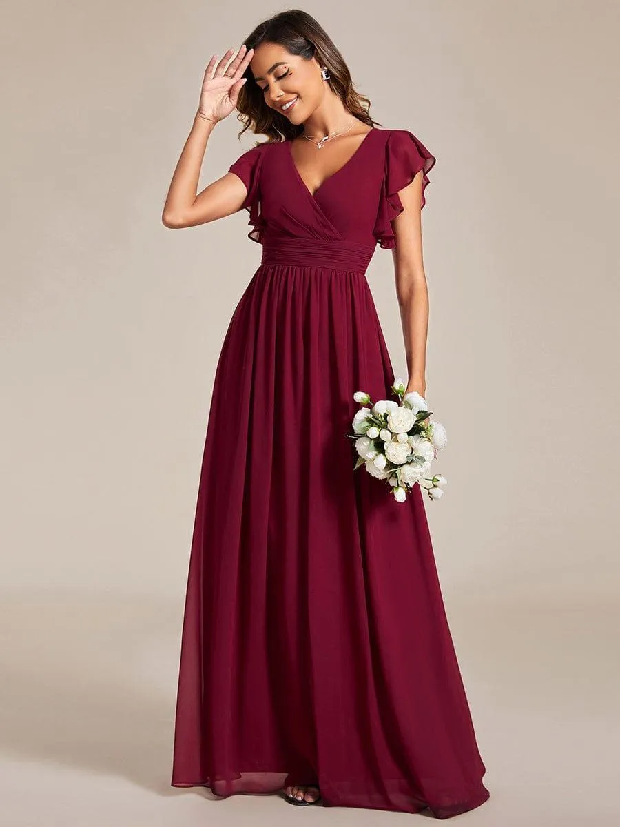 Robe de soirée en mousseline à manches volantées