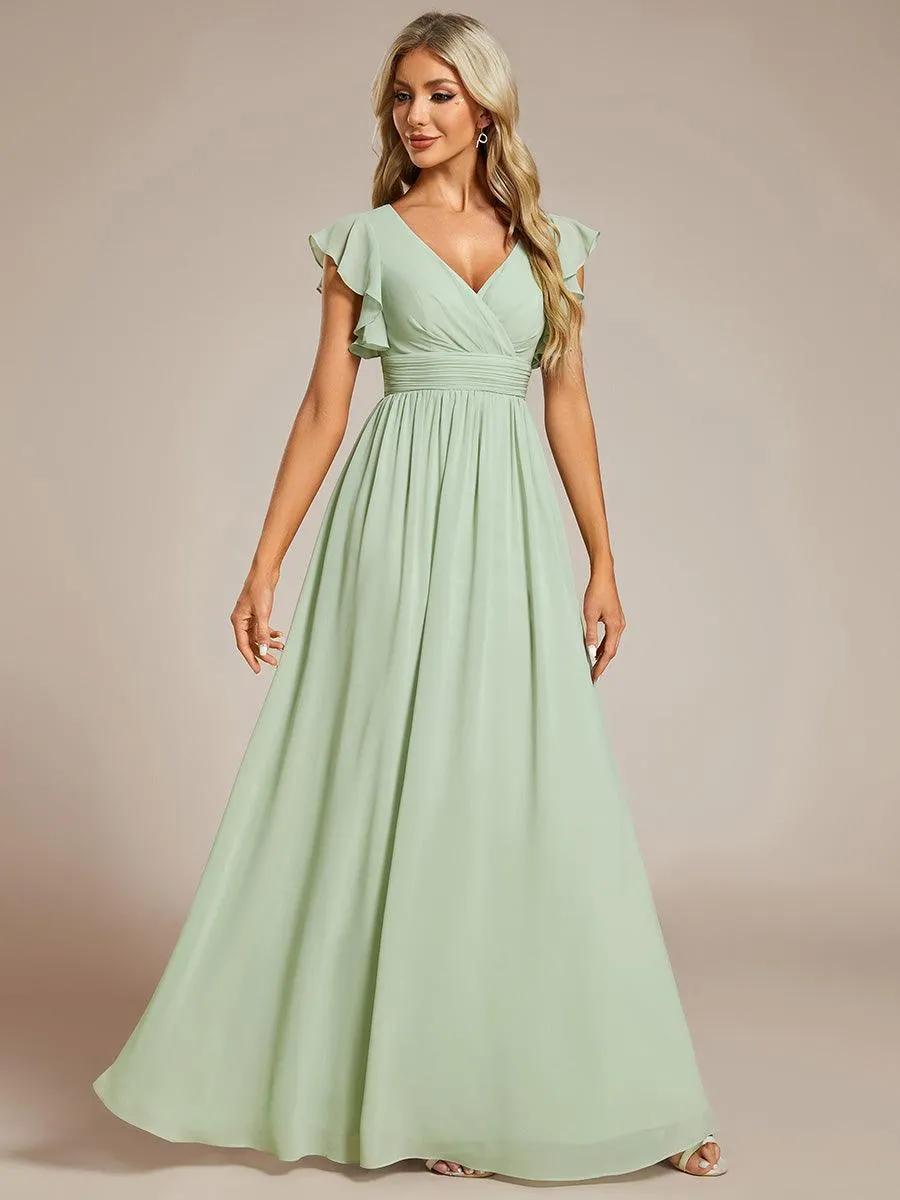 Robe de soirée en mousseline à manches volantées
