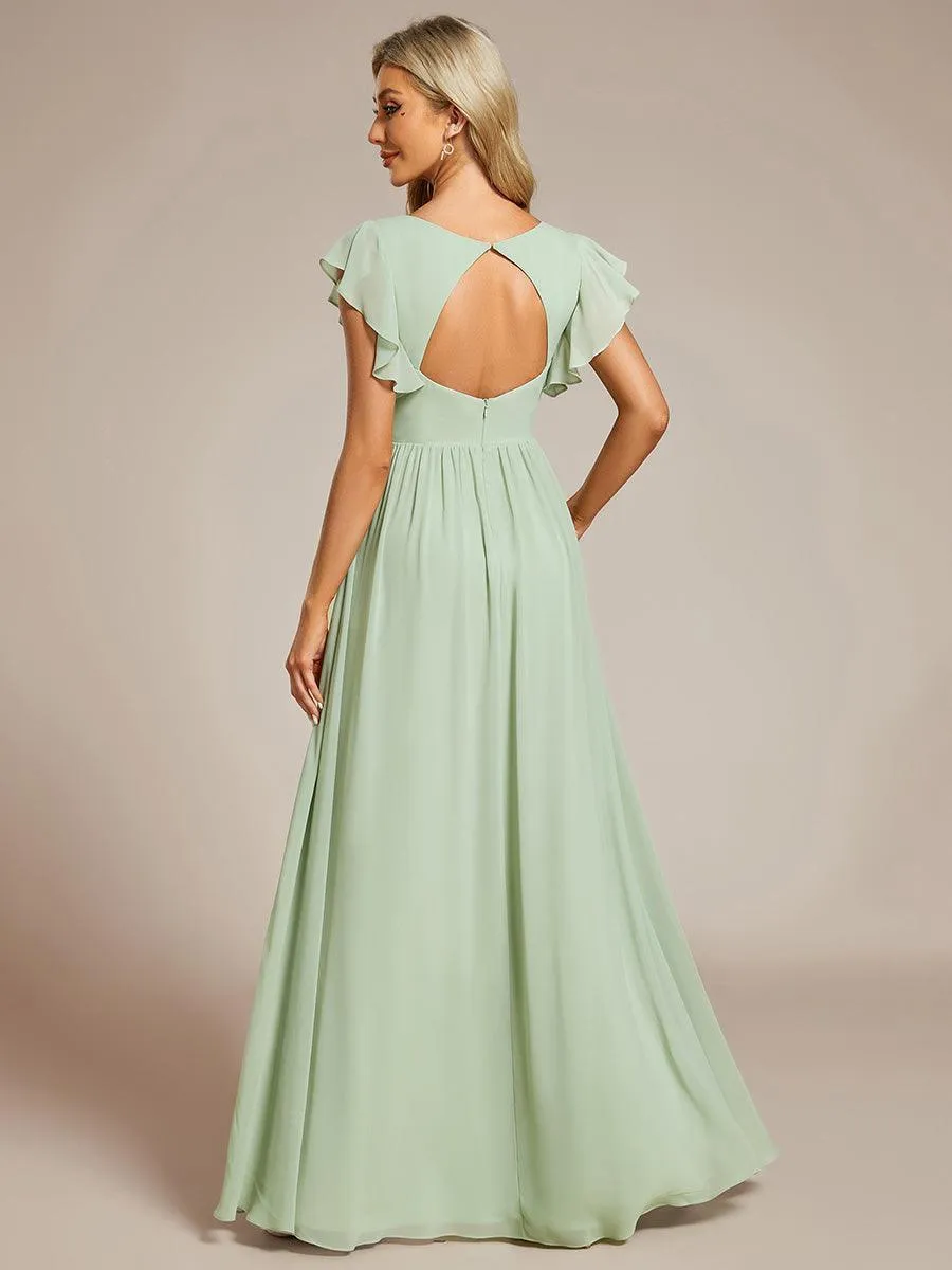 Robe de soirée en mousseline à manches volantées