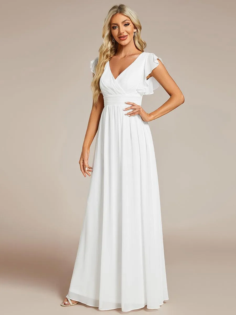 Robe de soirée en mousseline à manches volantées