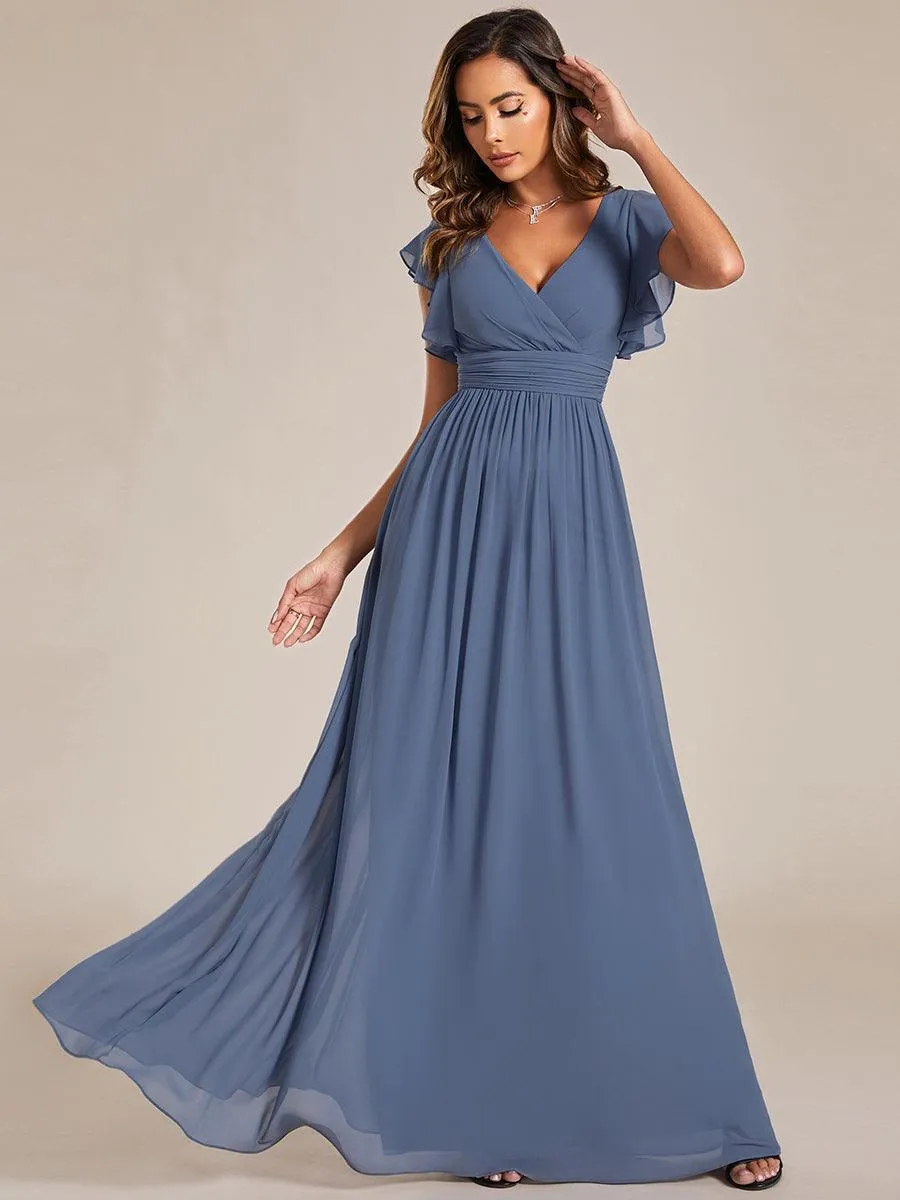 Robe de soirée en mousseline à manches volantées
