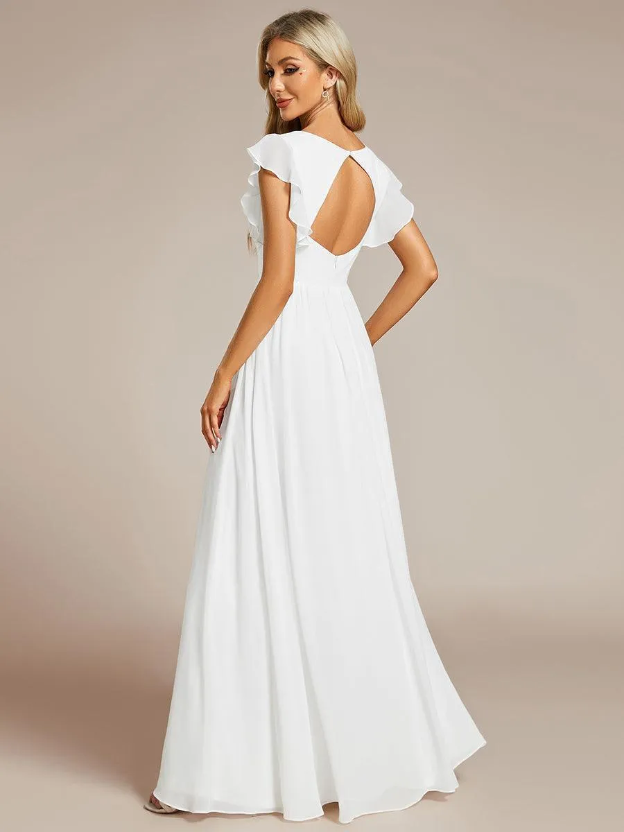 Robe de soirée en mousseline à manches volantées