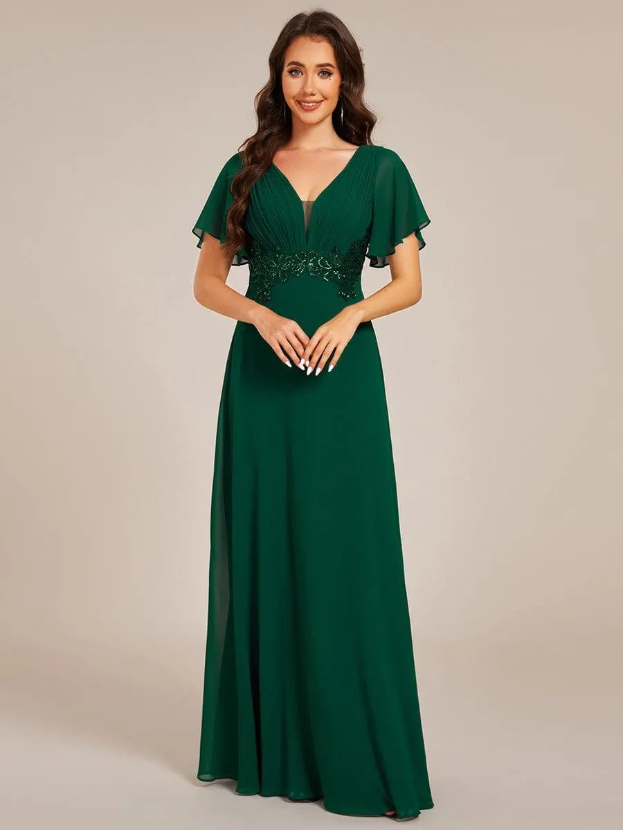 Robe de soirée longue plissée élégante à col en V profond
