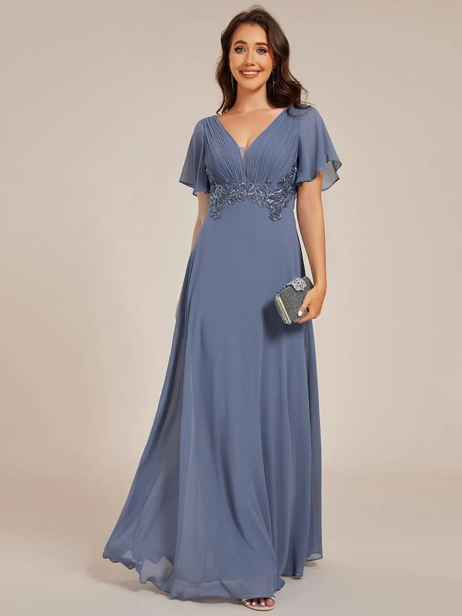 Robe de soirée longue plissée élégante à col en V profond