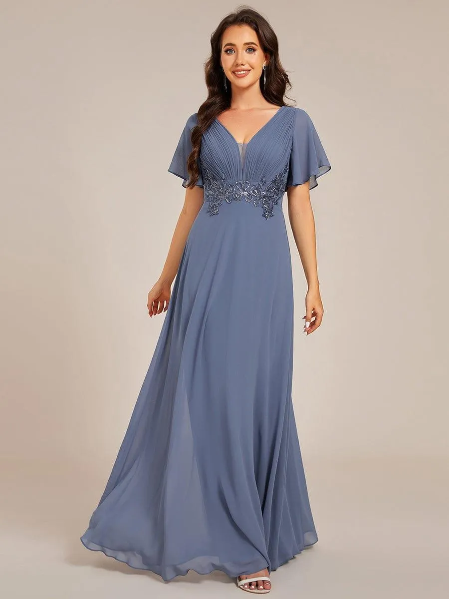Robe de soirée longue plissée élégante à col en V profond