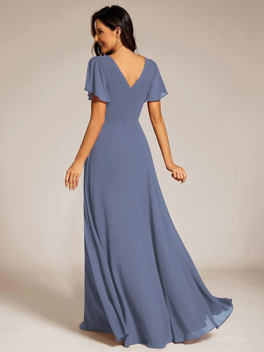 Robe de soirée plissée trapèze en mousseline de soie manches courtes et taille à sequins