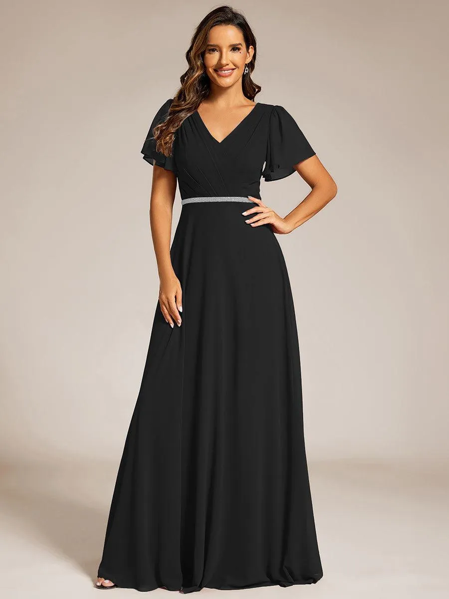 Robe de soirée plissée trapèze en mousseline de soie manches courtes et taille à sequins