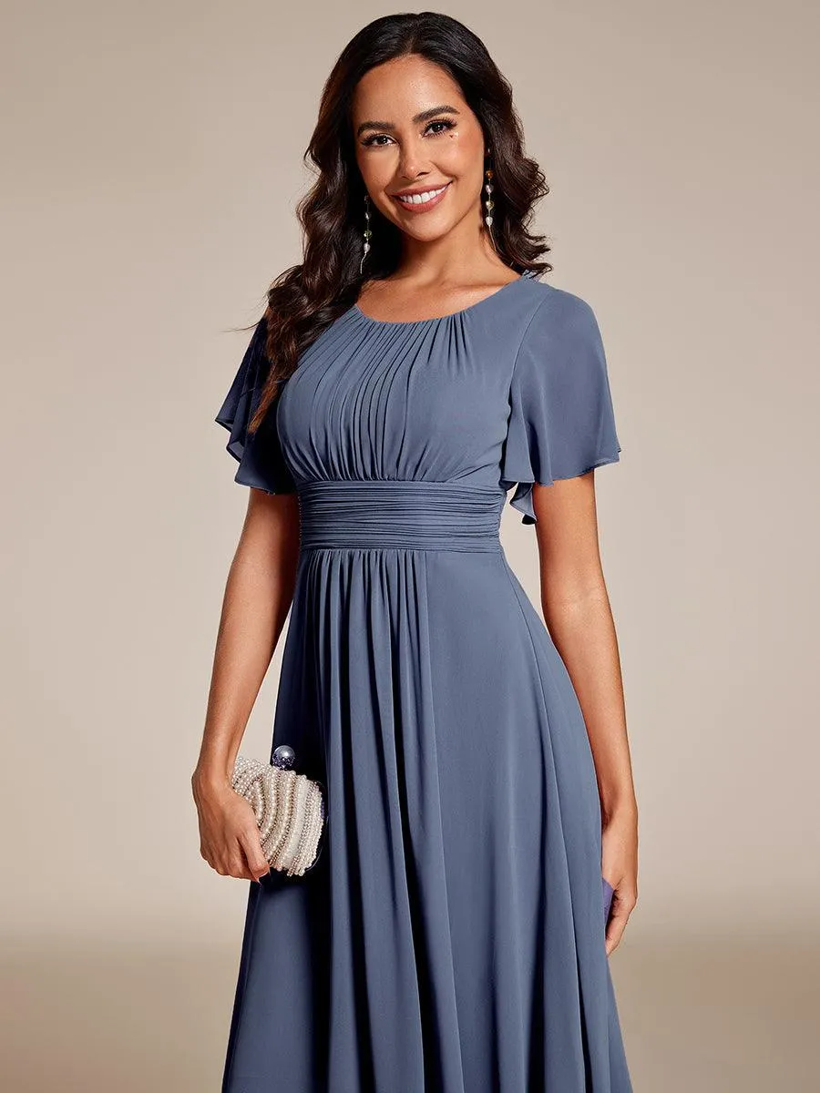 Robe d'invité de mariage trapèze en mousseline fluide à encolure ronde et longueur au genou