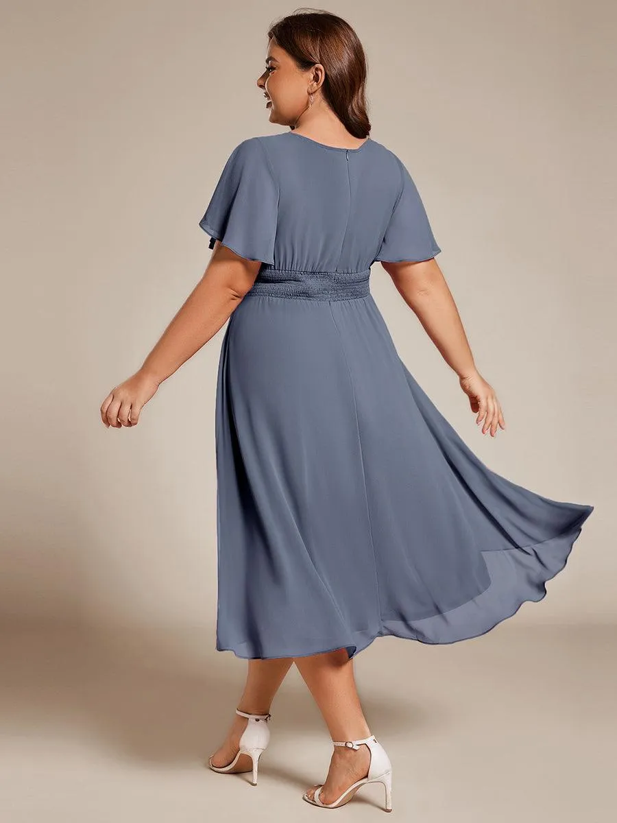 Robe d'invité de mariage trapèze en mousseline fluide à encolure ronde et longueur au genou
