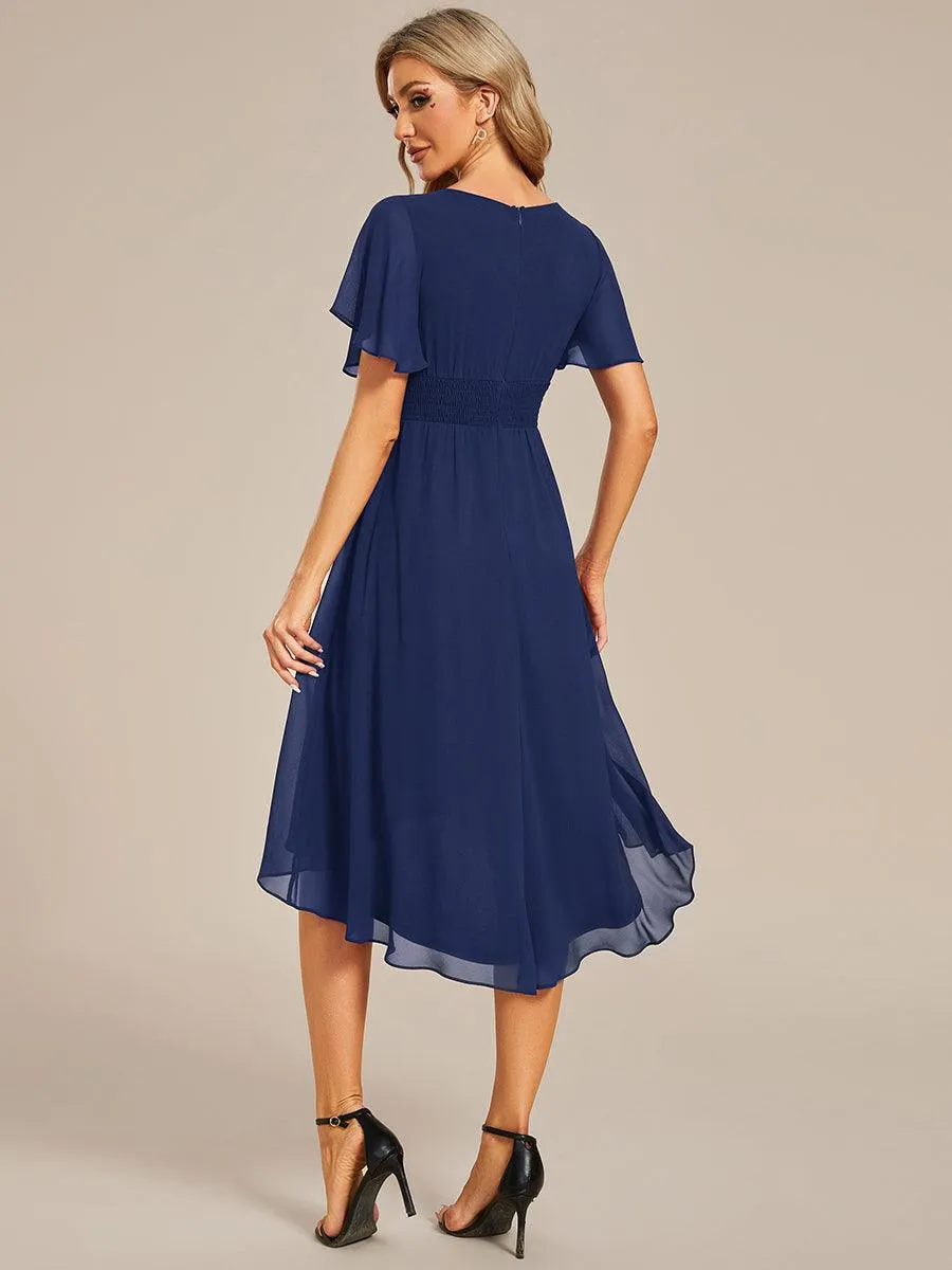 Robe d'invité de mariage trapèze en mousseline fluide à encolure ronde et longueur au genou