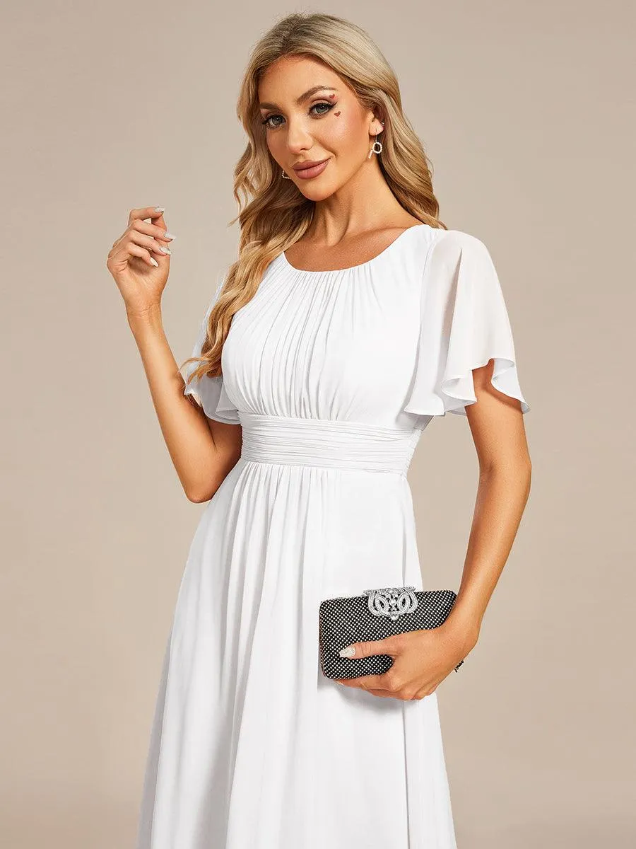 Robe d'invité de mariage trapèze en mousseline fluide à encolure ronde et longueur au genou