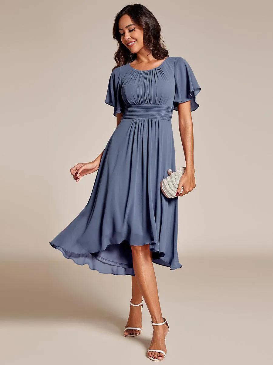 Robe d'invité de mariage trapèze en mousseline fluide à encolure ronde et longueur au genou