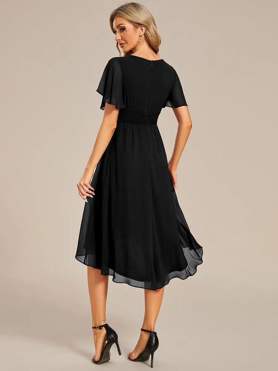 Robe d'invité de mariage trapèze en mousseline fluide à encolure ronde et longueur au genou