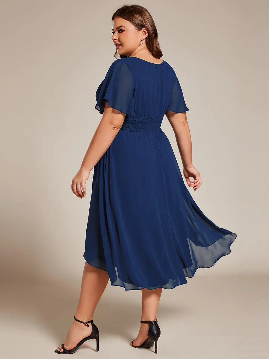 Robe d'invité de mariage trapèze en mousseline fluide à encolure ronde et longueur au genou