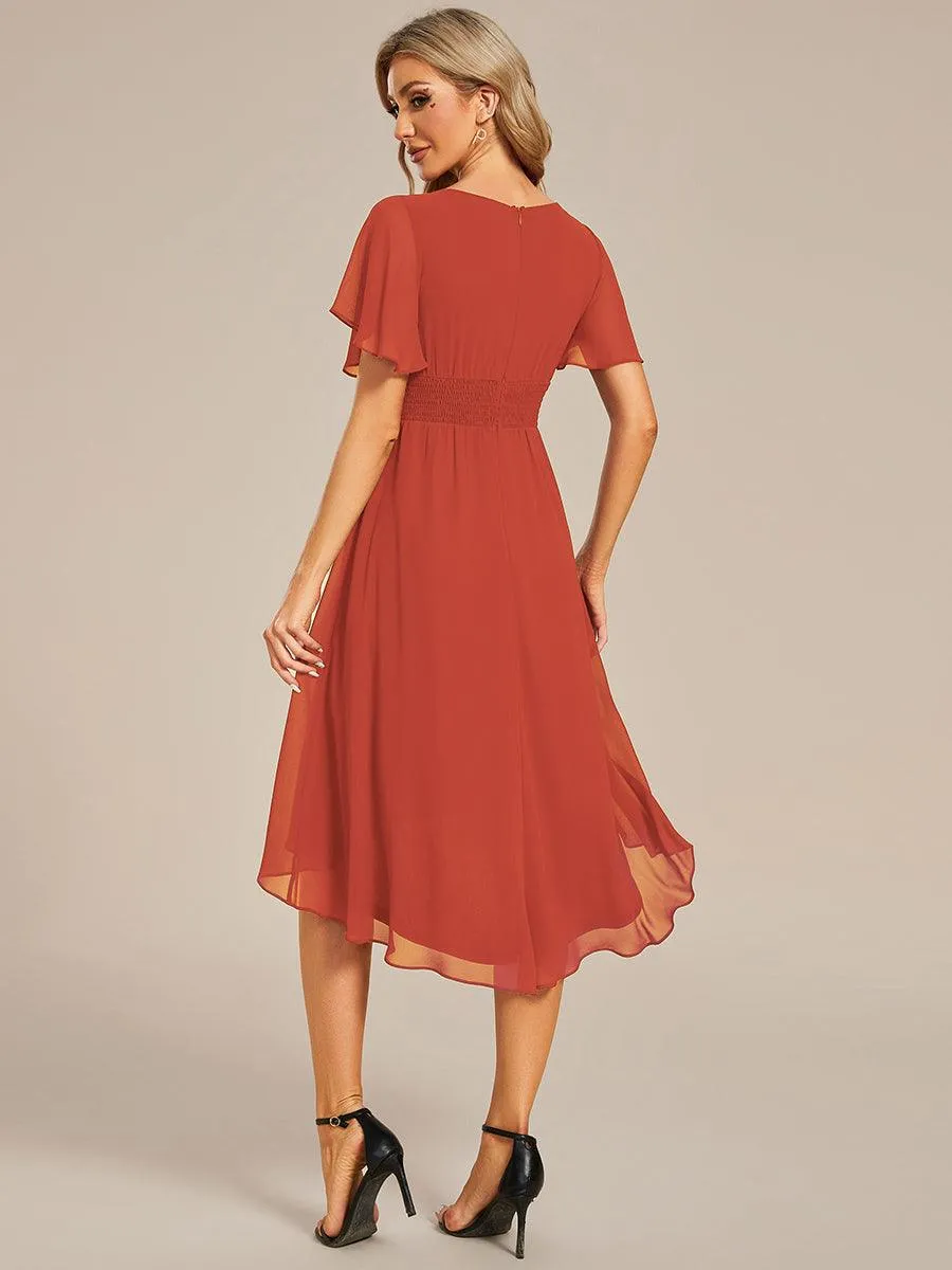 Robe d'invité de mariage trapèze en mousseline fluide à encolure ronde et longueur au genou