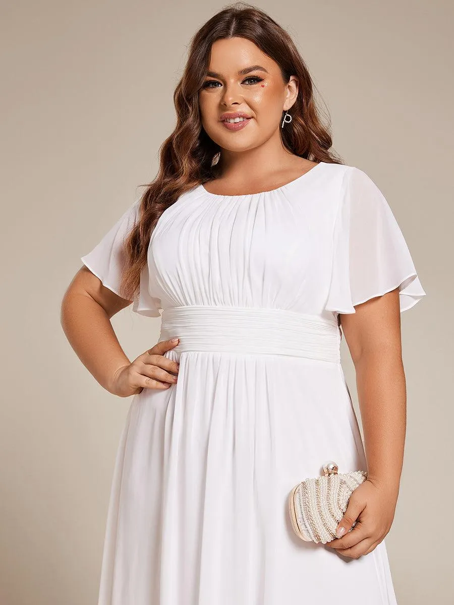 Robe d'invité de mariage trapèze en mousseline fluide à encolure ronde et longueur au genou