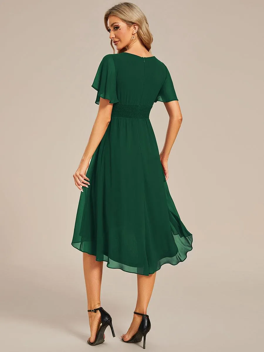 Robe d'invité de mariage trapèze en mousseline fluide à encolure ronde et longueur au genou