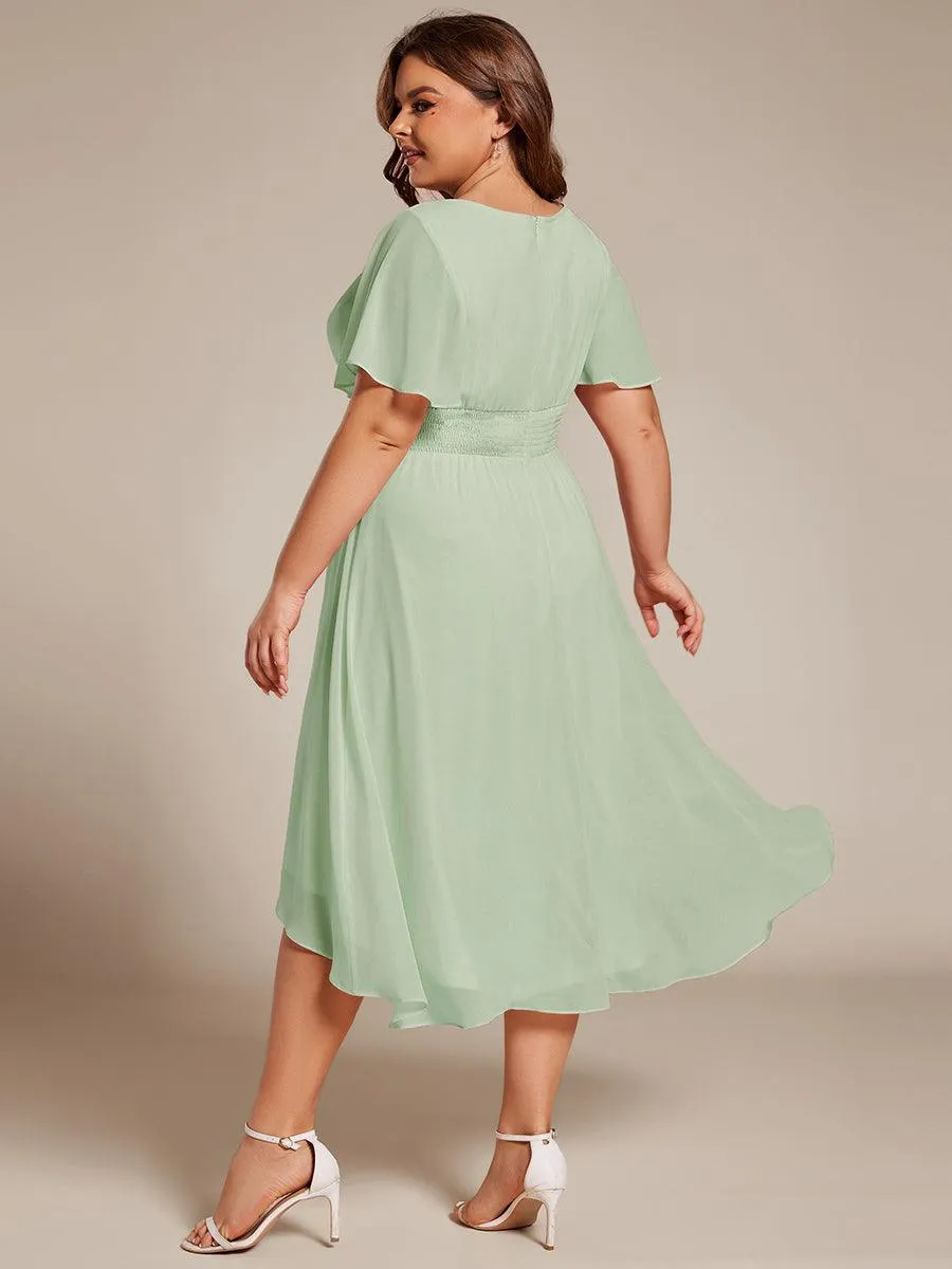 Robe d'invité de mariage trapèze en mousseline fluide à encolure ronde et longueur au genou
