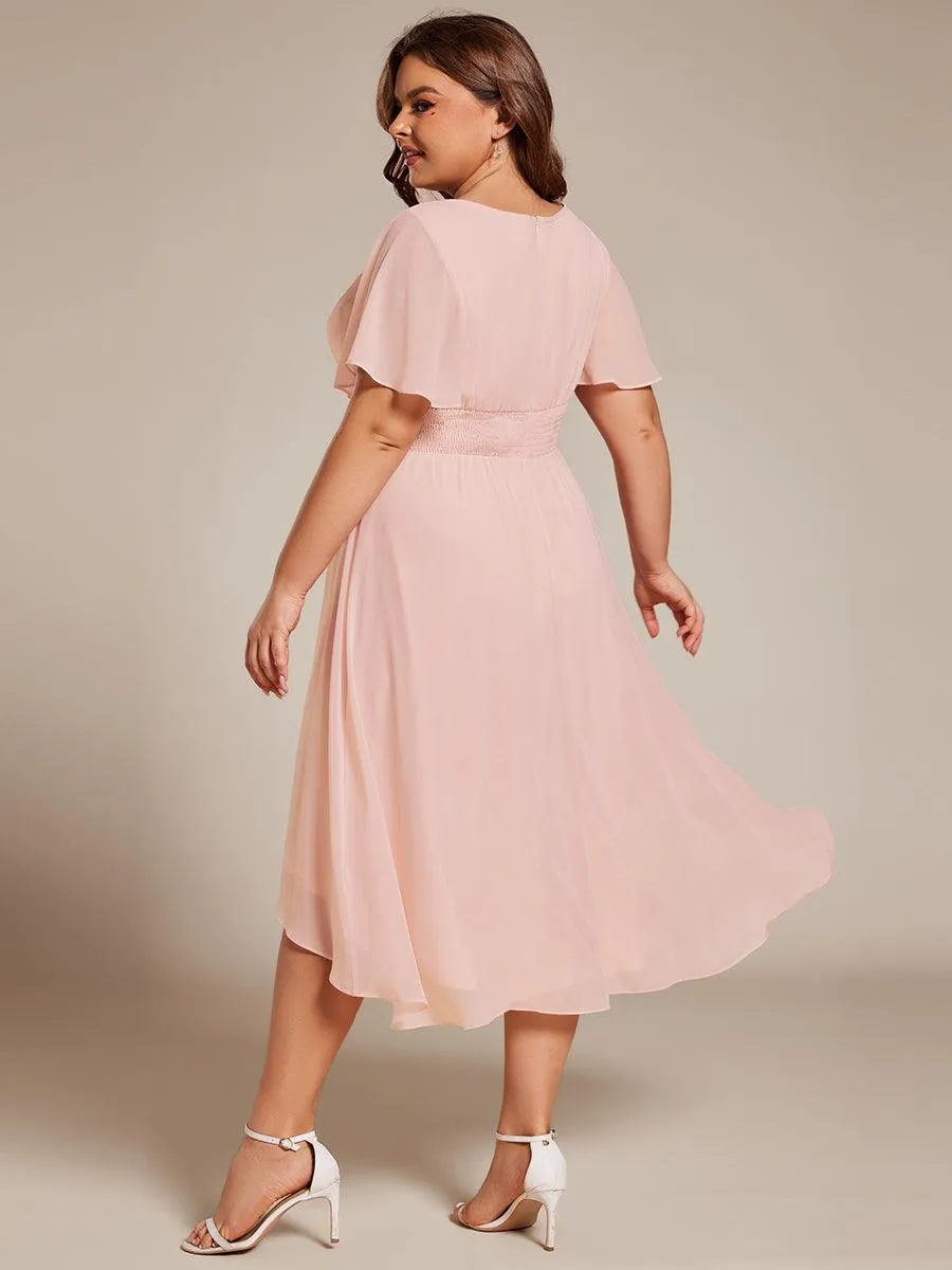 Robe d'invité de mariage trapèze en mousseline fluide à encolure ronde et longueur au genou