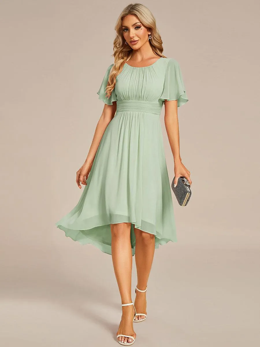 Robe d'invité de mariage trapèze en mousseline fluide à encolure ronde et longueur au genou