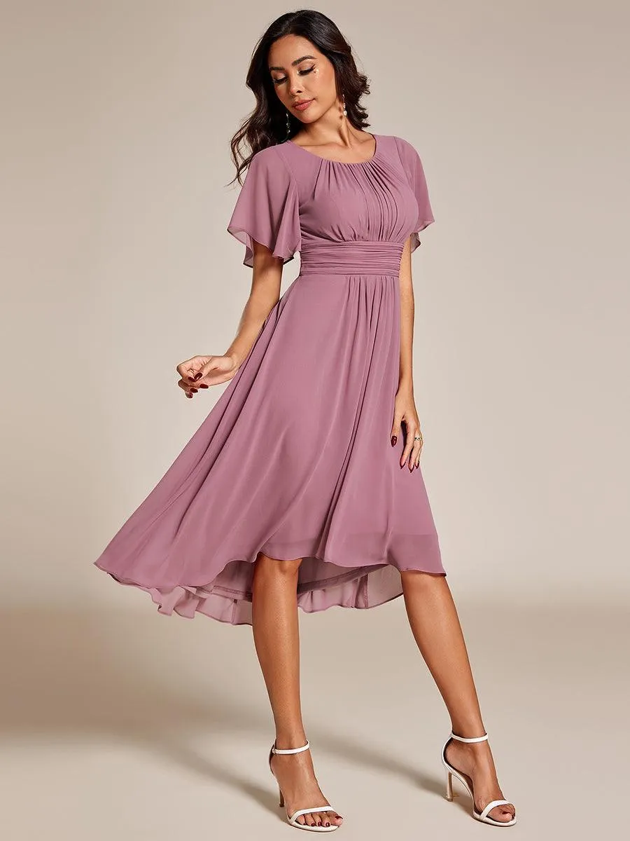 Robe d'invité de mariage trapèze en mousseline fluide à encolure ronde et longueur au genou