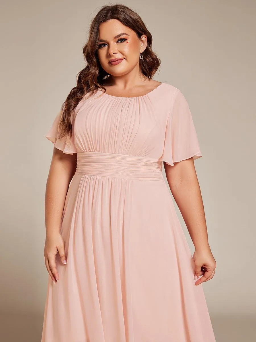 Robe d'invité de mariage trapèze en mousseline fluide à encolure ronde et longueur au genou